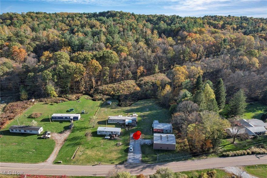 Endless Potential in Coshocton County! Sitting on just over 2.5 flat acres, this property offers flexibility and opportunity in every direction. Currently featuring two trailers generating $800 per month in lot rent, this is an excellent income-producing investment with both tenants on month-to-month leases. The trailers are tenant-owned, so you’ll collect steady lot rent without the upkeep! The property also includes a usable garage, perfect for storage or future use. If you’re searching for land to build your dream home or start a new project, this property can also be sold as vacant land — offering ample space and a convenient location just 10 minutes from State Route 16. Whether you’re an investor looking for cash flow or a builder seeking the perfect homesite, this Coshocton County gem is worth a look. Call today to schedule your private showing!