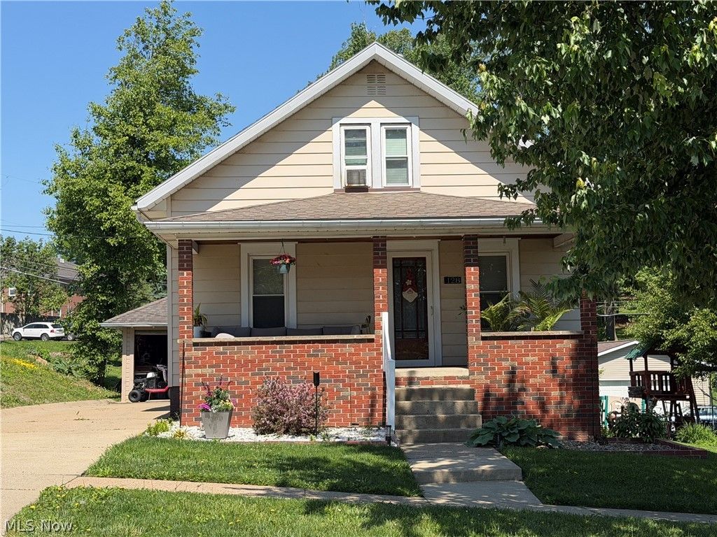 Photo of 128 Mill Street NW, Sugarcreek, OH 44681 (MLS # 5210858)