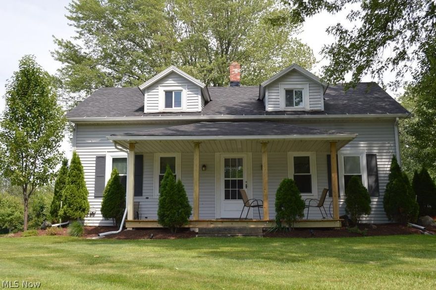 A little slice of heaven in the country, and a truly special place to call home.  So much has been invested since current owners purchased this property.  Renovated bottom to top, this 3 bedroom, 2 full bathroom, Century home sits on a little under 3 beautiful acres, giving you a feeling of vacation year-round.  Kitchen was expanded, beautifully updated and includes all appliances!  Laundry room conveniently located on main floor.  First floor owners’ suite has a full, completely renovated bathroom.  Second full bathroom was also expanded/renovated, also with nice updates.  Two bedrooms on second floor, with additional bonus space available for a playroom.   New roof, newer furnace, flooring, siding and windows (2003).  Ductwork for C/A –Furnace added to 2nd floor.  Updated 100 amp electrical.  New concrete patio in rear of home, new front porch, sprinkler system for all flower beds, raised deck provides access to above ground pool.  Newer, detached, 15 x 20, 1 car garage/outbuilding.