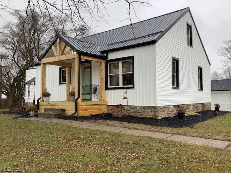If you are looking for country living yet close enough to all your shopping needs, then this house is for you. Located in Marlboro Township and Marlington School district. Approx 1 mile from the HS and Middle School. This 2 bedroom/ 1 bath home sits nicely on 2.5 acres of land and has a nice 2 car garage in the back of the house. This home has been completely remodeled in the past 5 years. Once inside the home you will notice the impressive woodwork done to this home with ¾ tongue and groove elm flooring, oak trim and the solid oak doors. The large open kitchen is set off by the granite counter tops and the shaker gray cabinets that offer plenty of storage. The option of 2 living rooms, main bedroom and the bath finish off the 1st floor. The second bedroom is upstairs is wide open and has all the stunning woodwork you will love. Outside you can relax on your deck or stone patio. More room for storage? How about the extra outbuilding that is 16x24 with a 10x24 lean to. There is also another bldg. to house your chickens or farm animal on your 2.5 acres of land. Free gas available. Also, first option for adjoining 8 acres with frontage on Columbus Road and Reeder Road MLS# 5005708.