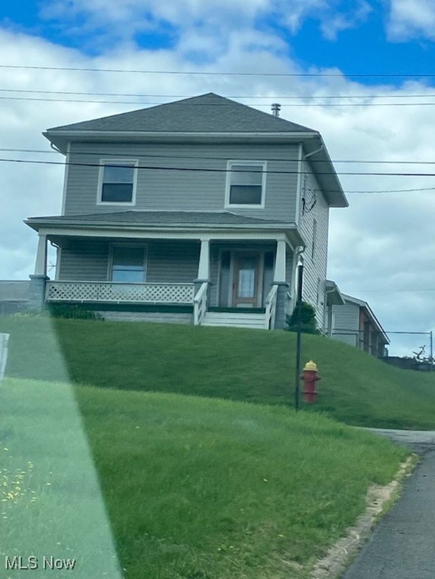 MOVE-IN READY 4 bedroom 2 bath home with spacious 3-car detached AMAZING GARAGE! Home boasts all new vinyl windows complete with transferable Lifetime warranty, and upgraded 200 amp electric panel. Newly carpeted 1st floor bedroom and full bath situated off the dining room makes for comfortable one level living. Three extra bedrooms can be found on the second floor with another full bath if more living space is desired. Boiler heat offers cozy warm rooms at an affordable price and boiler system has been on a yearly maintenance schedule. Living room has beautiful hardwood flooring and per seller carpeted bedrooms on second floor have hardwood beneath. Call to schedule your tour today!