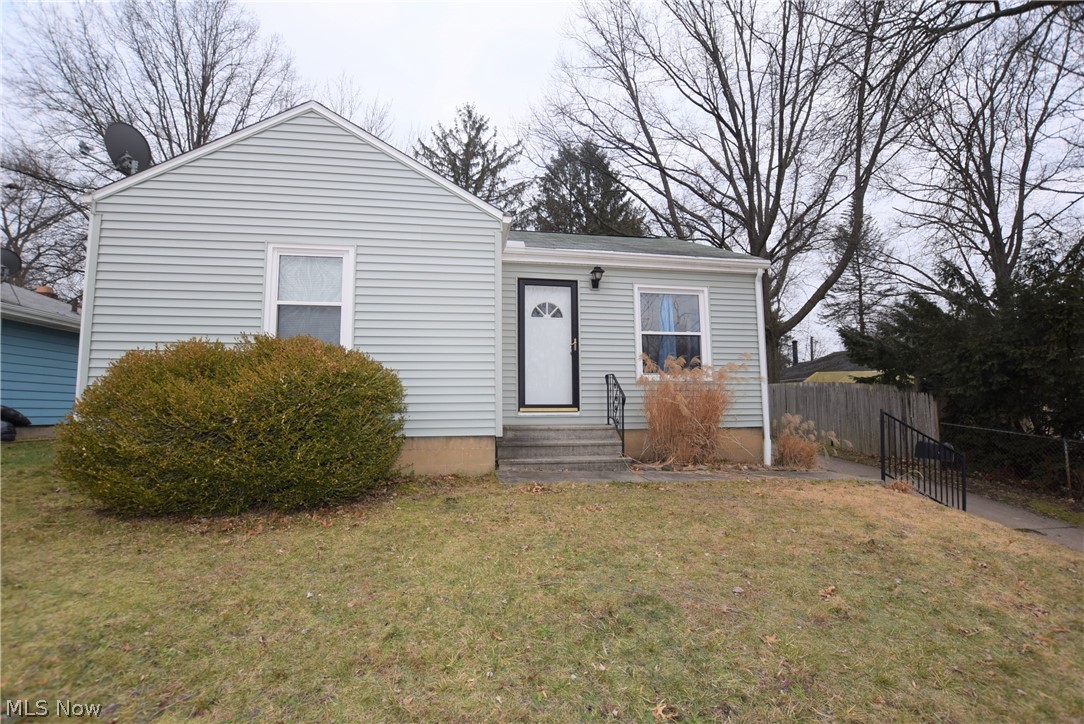 Welcome to 174 High Grove Blvd. in Akron with numerous updates throughout! Step into this lovely home to see gorgeous hardwood floors in the living room that extend to the hallway and two bedrooms. New siding installed in 2017. Windows were replaced in 2009. New furnace in 2018. Garage has a screened-in porch off the side, offering a wonderful spot to relax outdoors rain or shine. This home is located only three miles from Springfield Lake. Don’t miss your chance to own this home; schedule your private showing today!