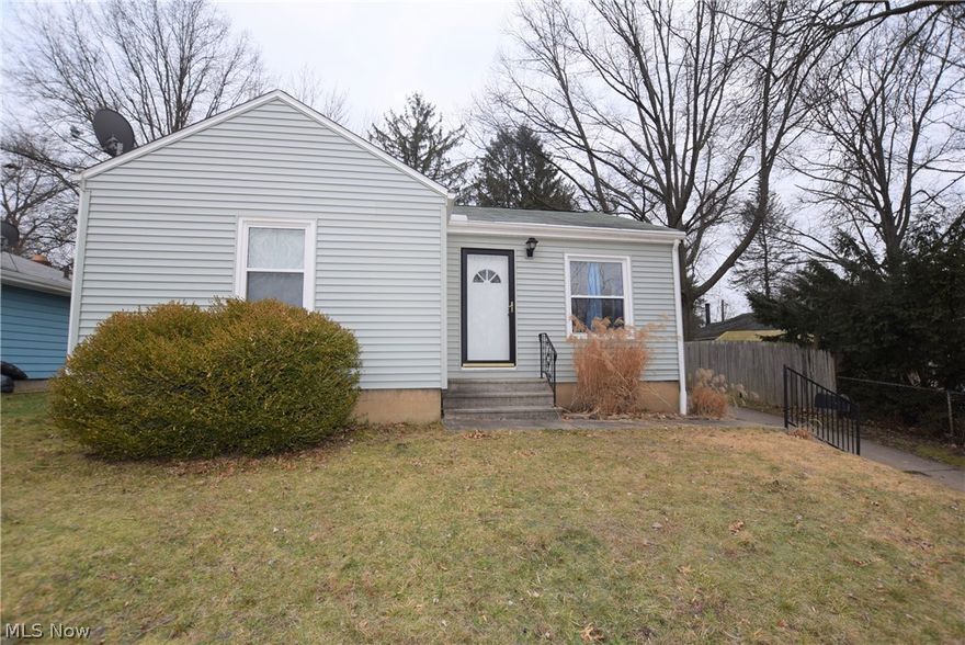 Welcome to 174 High Grove Blvd. in Akron with numerous updates throughout! Step into this lovely home to see gorgeous hardwood floors in the living room that extend to the hallway and two bedrooms. New siding installed in 2017. Windows were replaced in 2009. New furnace in 2018. Garage has a screened-in porch off the side, offering a wonderful spot to relax outdoors rain or shine. This home is located only three miles from Springfield Lake. Don’t miss your chance to own this home; schedule your private showing today!