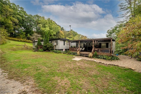 Photo of 5540 State Route 170, East Palestine, OH 44413 (MLS # 5254176)