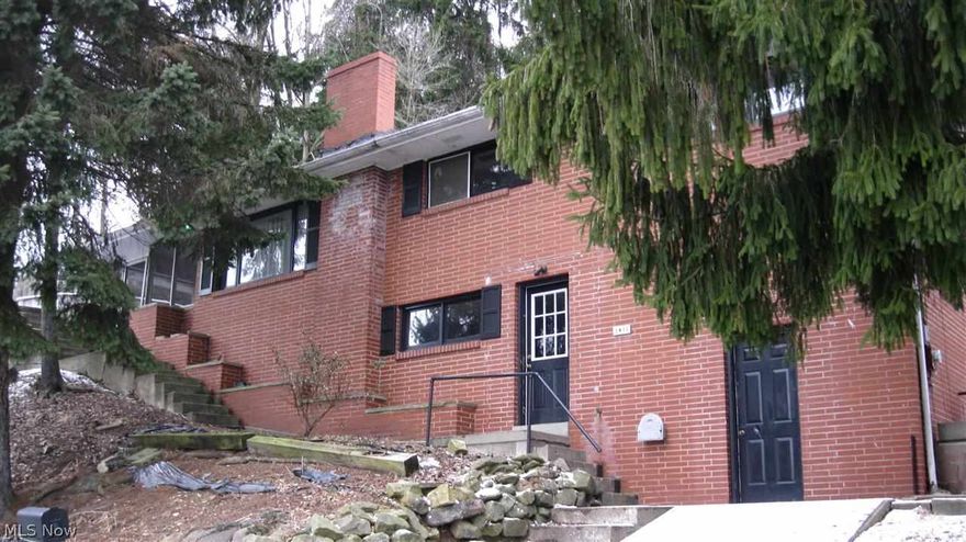 Large brick home in a great location. Rec room with fireplace and wet bar. 3BR, 2.5 bath with lots of storage. A MUST SEE!!