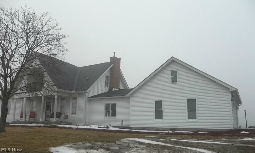 Beautiful country views await you on 13 acres! This historical, turn of the century home has 4 beds.2.5 baths. Completely updated with over 3,000 square feet! Custom kitchen with cherry cabinetry, including corian countertops. Family room has electric fireplace and additional rec room as well. Attractively landscaped with beautiful country views with fenced rolling pasture. Attached 2 car garage with an additional 4 car detached garage! Paved driveway. See what all this home has to offer you!