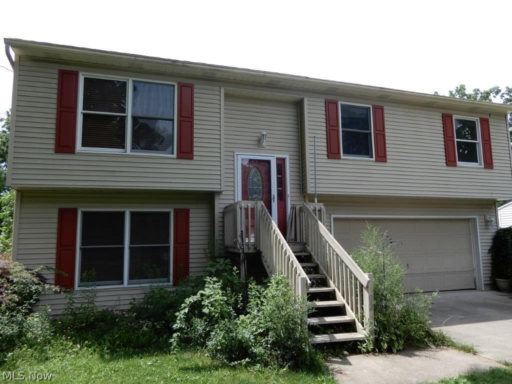Excellent opportunity in Mogadore! Bi-level home offers 3 bedrooms, 2.5 baths, and attached 2 car garage, and spacious fenced back yard! Don't pass on this chance to own a younger home (built 1992) with many updates, newer AC, bright kitchen, two levels of decks overlooking the back yard. The main floor features an open concept kitchen/dining/living area, three nice bedrooms, and 2 full baths! Basement has finished rec room, office/hobby room, laundry room and a convenient half bath. Make your appointment today!