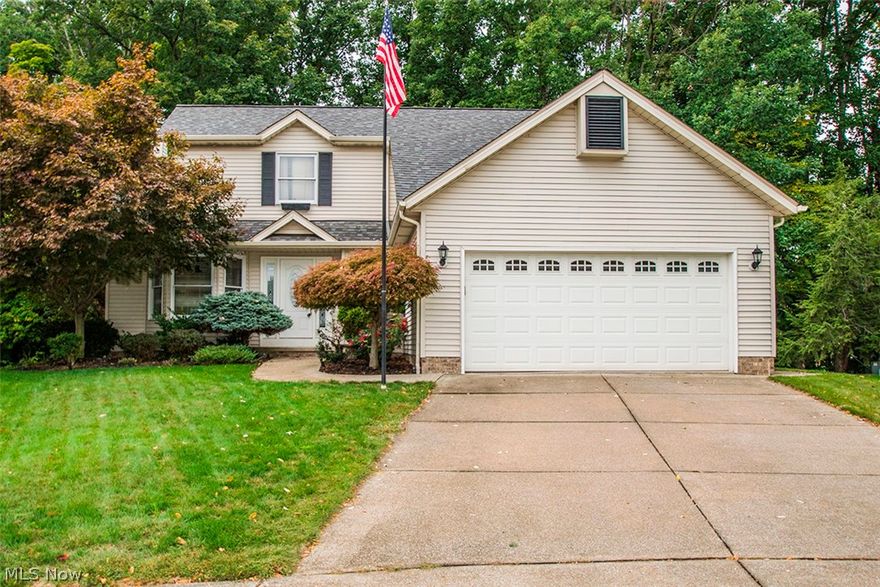 You must see this enticing modern colonial on most desired West Park cul-de-sac! Generous wooded western exposure lot backs right to the Metro Park! Watch the sun setting through trees on your sprawling 2 level rear deck! Inside you will discover the ideal open floor plan including a spacious vaulted great room with fireplace that joins 3 season room! The beautifully updated eat in kitchen with bay window boasts granite counters, ceramic tile floors and back splash and complete stainless steel appliance package! The roomy first floor master with tray ceiling includes a dedicated full bath! There is also a totally remodeled 2nd full bath on the first level!  Upstairs you will find 2 bedrooms with ample closed space and a 3rd full bath! The versatile full basement provides loans of storage! Other improvements include newer roof, ac unit, water tank and more! Home warranty included! Don't miss this one!