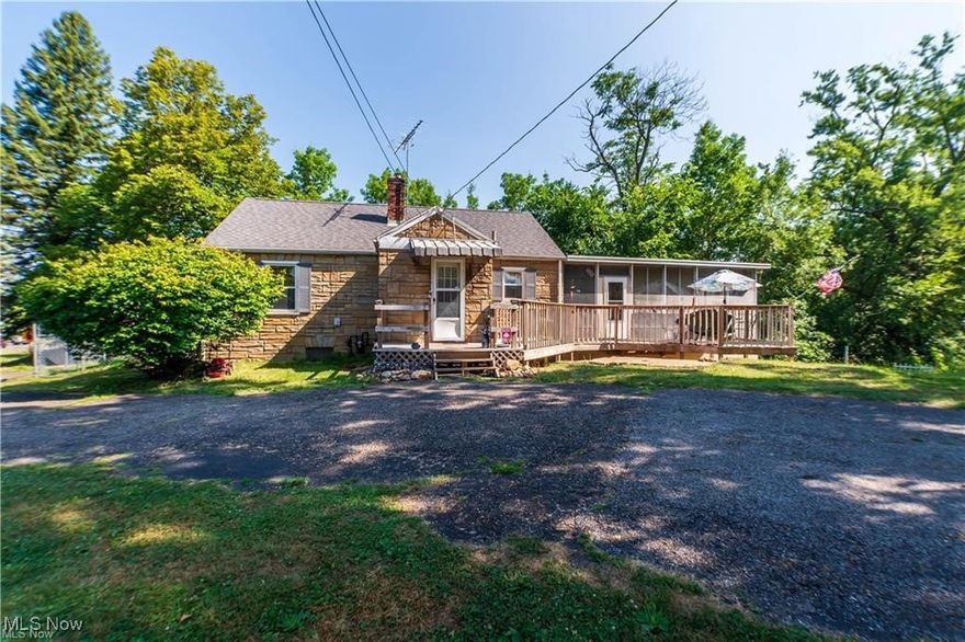 Welcome home to 3007 E. Waterloo Rd. This ranch style home features three bedrooms and one full bath and one half bath. Outside features a two car garage with an expansive wrap around driveway, offering plenty of additional parking. Inside, the kitchen connects to an oversized screened-in back patio, giving you a secluded spot to relax and enjoy the seasons. The living room connects to another patio that has a fenced in yard on the side of the home. This home was recently updated to public water from a well back in 2022! The basement has plenty of room for storage and has a very open layout that connects to the garage that also leads you outside into the back yard. This home is just ready for you to make it yours. Call to schedule your private showing today!
