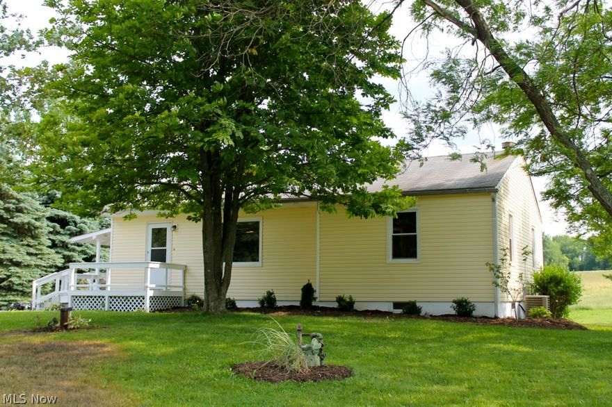 This ranch style house has been remodeled beautifully from the floor to the ceiling with high end fixtures that gives it a modern feel. The owner spared no expense by adding all new energy efficient vinyl windows, brand new siding, high grade laminate flooring, new carpeting, large espresso cabinets, granite counter tops, whirlpool jetted tub, glass tile mosaic bath surround, 96% efficient furnace and a/c, new H2O softener and heater & so much more! The basement is mostly finished which offers a 4th bedroom with a walk out to the back yard, along with a bonus/rec room & full bath with stand up shower. Garage could be 2 tandem very easily. It has been tastefully landscaped & ready for immediate possession.  Seller is in the process of installing a brand new aeration septic system.