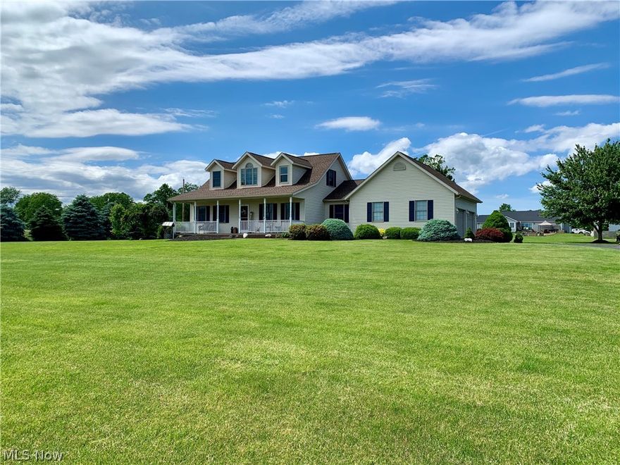 Beautiful home in a desirable north end neighborhood only a few minutes from shopping, restaurants and entertainment. First thing you notice is the beautifully maintained flower beds and the cozy front porch which give the home wonderful curb appeal. Upon entering you notice the grand two story foyer with gorgeous hardwood floors that carry into the large living room. Living room is painted a soothing pale blue and also offers a gas fireplace and lots of windows for a beautifully sun drenched space. If you enter the kitchen from the garage you have a cool recessed storage/coat space to unload your things. Just beyond that is a half bath and your laundry conveniently located on the first floor. The kitchen itself offers white cabinetry with pull out drawers, granite countertops and stainless appliances that all stay. The eat in area of the kitchen has doors that walk out to the recently poured concrete patio space. The master suite is also on the first floor and offers an en suite with