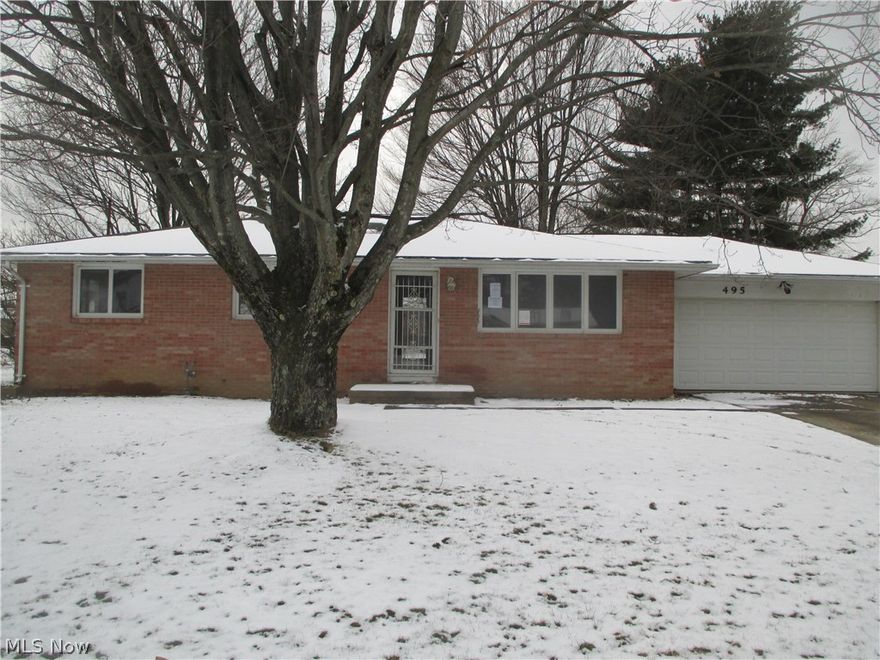 Nice brick home with 3 bedrooms and full basement. Needs paint and carpet in living room. Great location.