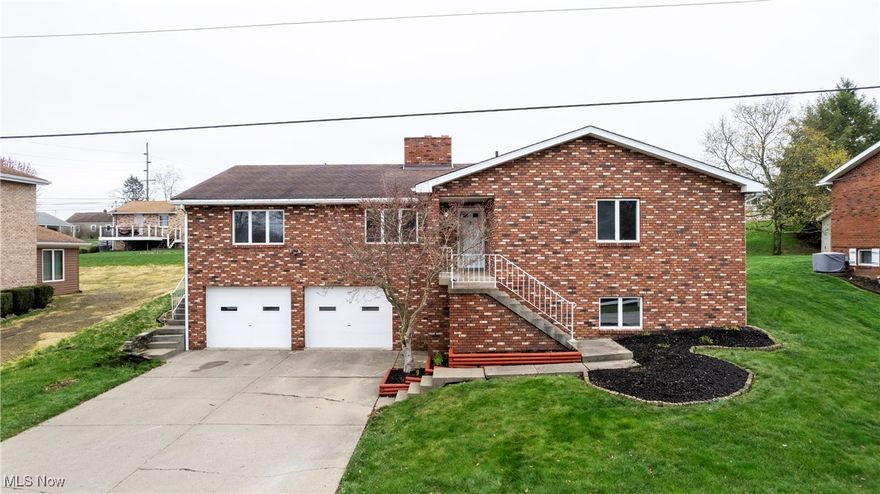 Welcome to this beautifully renovated 3-bedroom, 2.5-bathroom brick home, offering over 2,300 square feet of comfortable living space in the desirable Allison Acres neighborhood. Step inside to discover a bright and airy open-concept layout that seamlessly connects the expansive kitchen and dining area, complete with a cozy fireplace—perfect for gatherings and entertaining. The spacious master bedroom features its own private bathroom, while two additional generously sized bedrooms provide ample space for family or guests. Enjoy the luxury of a stunning new bathroom, designed with modern finishes to enhance your daily routine. A large, unfinished basement presents endless possibilities for customization, whether you envision a recreational area, home gym, or additional storage. The home also boasts a roomy 2-car garage and a delightful patio off the dining room, ideal for outdoor relaxation and entertaining. Don't miss the opportunity to make this beautifully updated home your own! Schedule a showing today!