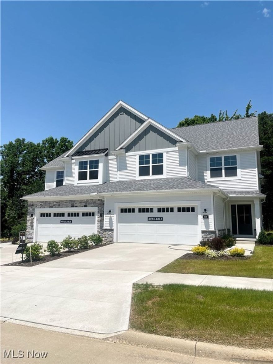 Gorgeous new Cobblestone available for move-in, situated w/in the Brecksville-Broadview School District!  The covered entryway welcomes guests into a spacious foyer with luxury vinyl plank flooring, which flows through the hall, laundry, and kitchen.  The vaulted great room boasts a stone-to-ceiling fireplace and dramatic window wall that lets in loads of natural light.   Owner’s will love well-equipped kitchen that offers ample storage, a quartz island, walk-in pantry, upgraded cabinetry with dovetail construction and soft-close doors/drawers, gold hardware, and stainless GE appliances.  The spacious dining area opens to a composite, low-maintenance deck with wooded views!  A powder room and laundry room w/ utility sink conveniently located off the 2-car garage complete the 1st floor.  A spindle-railed staircase leads you upstairs, where you’ll find a spacious owner’s suite w/ vaulted ceiling, private bath with tile shower and frameless glass door, and quartz vanity with dual sinks.  Each additional bedroom has its own walk-in closet and shares a full bath.  A full basement w/ rough-in for future full bath provides extra storage space or opportunity for future finishing.  Walking distance to shopping, dining, rec center and more, and less than 5 minutes to I-77 for easy commuting. Now Ready for Move-In!