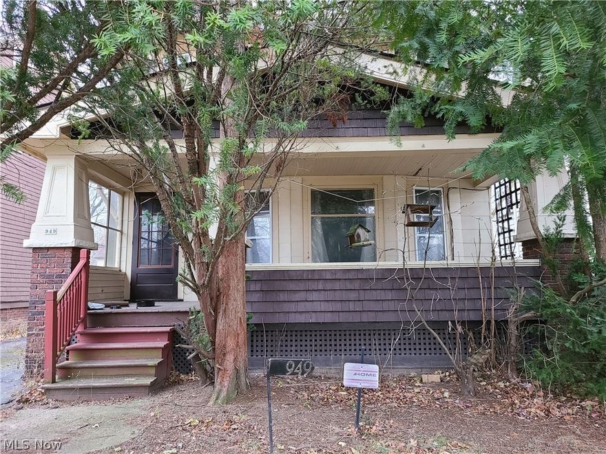 949 Brunswick Rd, Cleveland, OH 441123 beds plus bonus on 3rd floor, 1 full bathroom 2nd floor, 1 partial in basement level, 2+ car garage, huge front porch with double entry, rear enclosed back porch entry, gorgeous trim and doors & plenty of details throughout including stained glass & leaded glass, coffered ceilings, plastered arches & details, details, details! Gorgeous trim, fireplace mantel, side board for the dining room, original trim and lots of potential in this home! 2 doors down sold for $225k Living Room has original leaded and stained glass windows as well as the dining room with oversized original trim throughout! The gorgeous arches are also breathtaking! There is a sun room on the rear of the second floor as well as a walkup 3rd story! Unfinished basement had a water line freeze that dumped water into the basement level. GREAT OPPORTUNITY, the homes in need of love and cleaning out and water line repair. There is a bunch of chattel and personal belongings in the home t