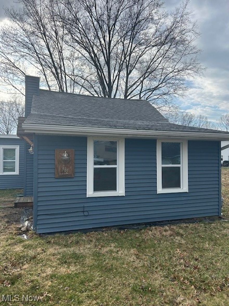 Charming and cozy cottage-style home located in the heart of Sheffield Lake, just a short stroll from the lakeshore and marina. This well-loved residence features three comfortable bedrooms and a full bath, all in a thoughtfully laid-out single-level design that makes daily living easy. The interior has been recently refreshed, offering updated flooring, a modern kitchen, and a renovated bathroom. You’ll appreciate the convenience of in-home laundry and a detached garage that provides storage and off-street parking. The yard offers a peaceful outdoor space, ideal for relaxing or entertaining. With the lake nearby, local boat launches, and community amenities, this home is a true gem for anyone seeking a relaxing lakeside lifestyle.