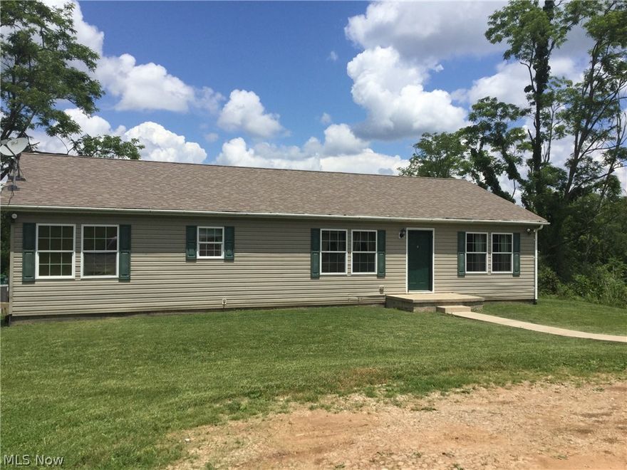 Beautiful acreage which includes mineral rights. Stocked pond includes bass, sun fish, hybrid sun fish and cat fish. Home is very well maintained with an open floor plan. Includes a chicken coop and 2 outdoor storage buildings. Peaceful and serene setting. A must see!!