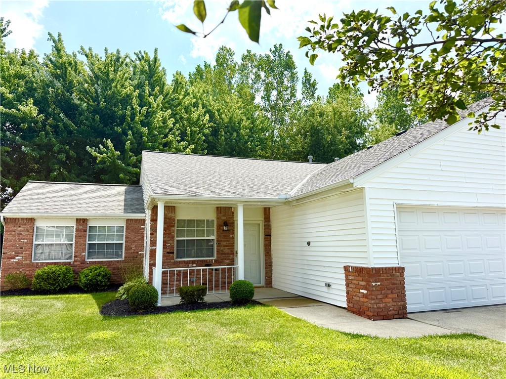 Nicely maintained brick and vinyl ranch condo in North Creek Villas with 1452 square feet. Immediate occupancy offered on this open floor plan unit. Front door entrance into the vaulted great room with ceiling fan, to the left is a good size family room with sliding doors to a private patio. Oak kitchen with all appliances and a breakfast bar. Master suite has a private bathroom with stall shower and an 8' walk-in closet. There is a second bedroom and a full hall bathroom with a bathtub. The laundry/mud room is off of the 2-car attached garage and offers a washer & dryer. The front porch/patio is covered, and the back patio (with extension) overlooks a private landscape. The common area on the side of the condo offers green space. Natural light, mini blinds, glass storm door, and a 12-month home warranty complete this great unit. Easy one-floor living!!!