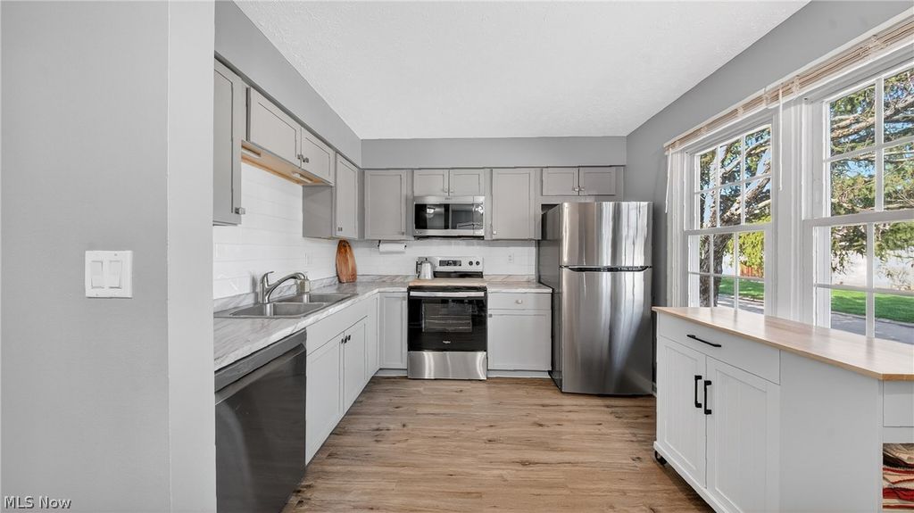 Photo of 5236 Creekside Boulevard, Brunswick Hills, OH 44212 (MLS # 5196290)