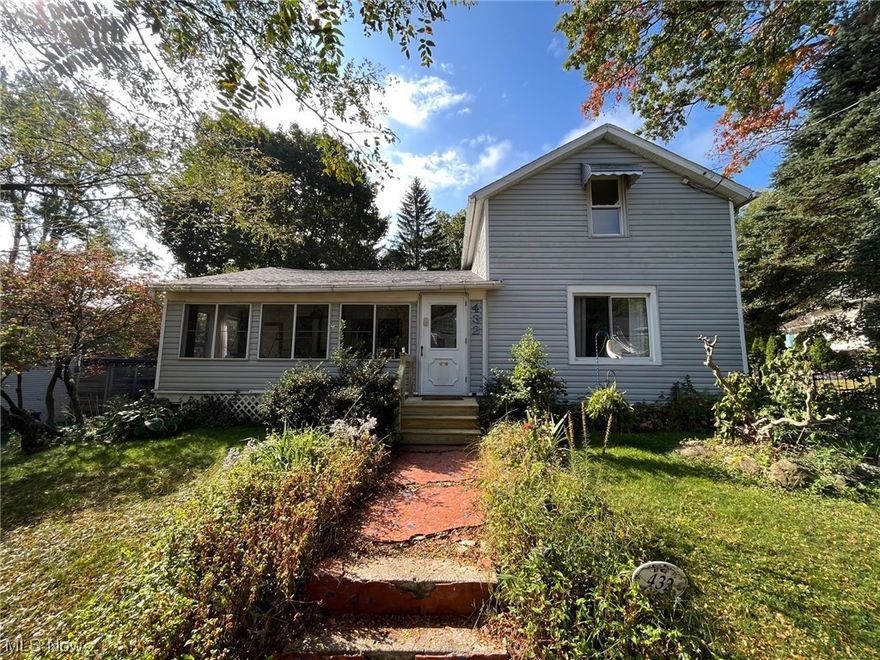 Location, location, location!!! This amazing home just had new floors put in, new carpet installed on the second floor, the full bathroom has been redone, new back deck installed and the interior has been freshly painted- all within the last month!!! Situated on a quintessential Kent street, this home is a must see! Built in 1901, this 3-bedroom home has character and charm, and complete first floor living. It is quite rare to find a century home with such great closet space and high ceilings. With a primary bedroom, full bathroom and laundry room all on the first floor, it is ideal for anyone looking for convenience in living while not giving up any square footage. The primary bedroom has its own half bathroom, with direct access to the wooded backyard view. The enclosed front porch is the perfect spot for your morning coffee or your evening relaxation. The large dining room and separate living room are perfect for all of your entertaining needs, while the kitchen has everything you need for your homemade meals. The two bedrooms upstairs have natural light pouring in, along with wood floors. The huge backyard is fenced in and provides you with privacy, gardening and tons of room for fires and backyard games. Located close to downtown Kent, the University and all of the shopping and dining. Do not wait to get your showing scheduled! Call TODAY before this one is gone!