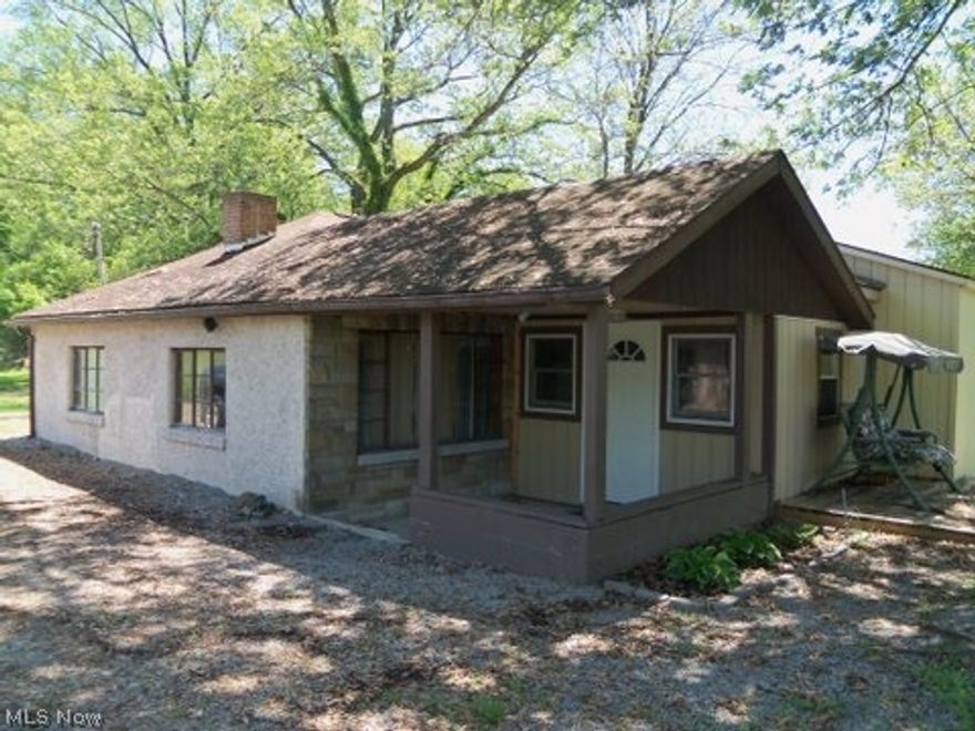 PrIcE REdUced**** Again*****  2-3 bedroom home in Maysville school district.  Located on quiet dead end street.  High efficiency furnace installed approximately 5 years ago.  Generous sized Utility room houses washer/dryer, furnace, shelving and electric panel.  Home has some updates.   Includes ceramic tile in kitchen and utility room. Newer counter tops.  Stove will stay. NEW carpet laid in living room and a bedroom. Both bedrooms have nice size closets with one being a walk in.  There has been an addition started with a partial bath included. It's 14x20 and it will have a separate electric unit with heat and air conditioning.  One car detached garage with electric and a work area also. Nice Home with a potential of 1250 square feet total...!    $12.00 watershed tax and $15.49 Newton Light tax.  See It Today!