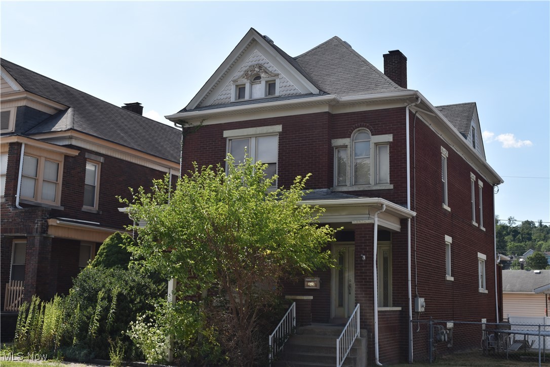 This charming brick building, previously utilized as a doctor’s office, features beautiful original period woodwork. The property includes two half baths and is zoned for commercial office use. It boasts a total of ten rooms along with a third-floor attic space for additional storage. Convenient on-street parking is available, and the location is in close proximity to Route and I-70.