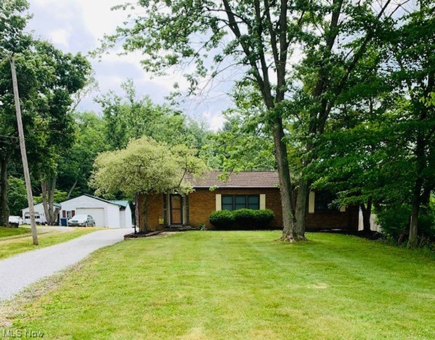 Check out this charming brick ranch sitting on a picturesque 1 acre lot! This 3 bedroom, 2.5 bath home features hardwood floors in the bedrooms, brand new Luxury vinyl plank flooring in the living room, and new tile work around the fireplace. You'll appreciate the stainless steel appliances, Kraftmade white cabinetry, tiled backsplash, and 
Corian countertops in the kitchen. Did I mention there is a 40'x25' steel outbuilding with concrete floor?! This makes the PERFECT spot for homeowner projects or a car/truck enthusiast! Don't let this opportunity pass you by!