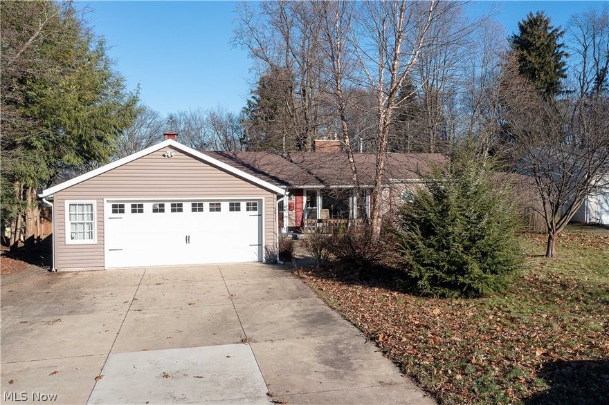 This Lovely ranch-style home in Plain Local School District is located just outside Avondale. An inviting floor plan on the main level begins with a foyer with built-in storage and wood floors to a roomy living room with abundant natural light from the almost floor-to-ceiling front windows. The kitchen offers white cabinets, tile counters, and a window connecting the kitchen/dining room, perfect for entertaining. The formal dining room has sliding doors open to the large covered deck. Spacious master bedroom with a sitting area w lots of storage space & closet, plus access to the den/office/family room whatever your heart desires. There is a full bath and two others bedrooms (one w a laundry hook-up for convenience). The lower level includes a finished rec room, a full bath, plenty of storage space, and a large workshop area. Fenced-in private backyard. Tandem 3 car garage with plenty of storage. Some updates include basement waterproofing Ohio State Waterproofing (lifetime warranty tr