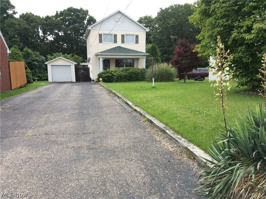 This centralized 2 BR home features a large family room overlooking a fenced in backyard.  The new bathroom has both a tub to relax in and a walk in shower. The house has a newer roof, carpeting, and hot water tank. This move in ready home is waiting for you!! Call today to check it out.