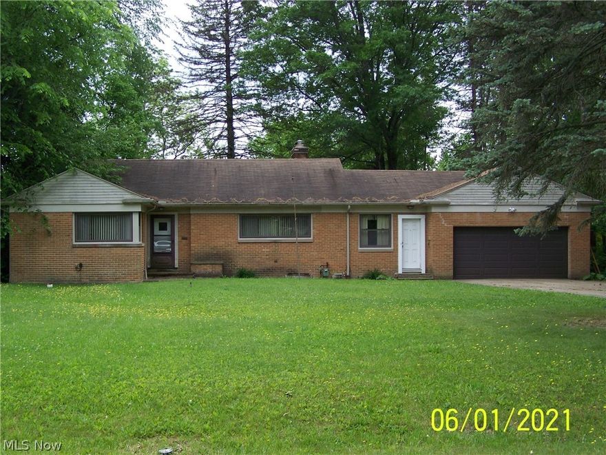 Love a brick ranch? Here's the Best Buy in Brecksville! Situated on almost a half an acre wooded lot, this home offers a large living room with a gas fireplace, bay window overlooking the palatial backyard and hardwood floors throughout!  The vintage eat-in kitchen offers lots of cabinetry and all the appliances stay. Both bedrooms are good sizes and there are two full baths--one on the main floor and one in the basement! The full basement is huge and offers many possibilities! There's an egress window which provides access to the outdoors if needed, glassblock windows and another fireplace!  Also, a large laundry room is located here along with a newer furnace (10/2015) and hot water tank (2018). Bring your HGTV ideas and make this home your private sanctuary! Beautiful Brecksville location---close to schools, I-77, shopping; library, rec center and MORE!