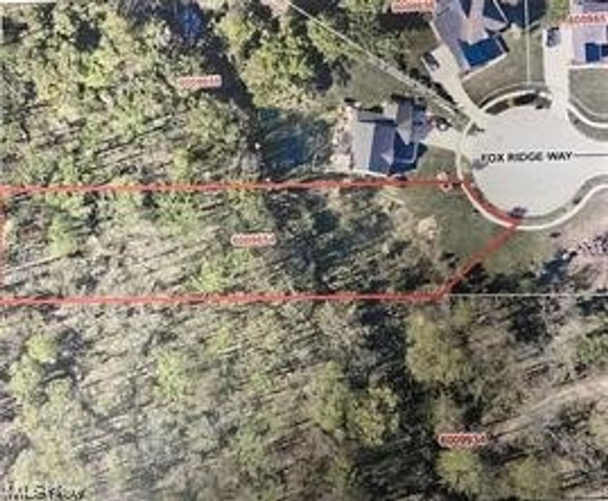 Private wooded lot located at the end of the cul-de-sac. Last lot available in the Fox Ridge Development.
Build your Dream Home in a quiet, natural surrounding knowing that you are protected from new
construction on all sides. The spacious suburban lot is just under 1 acre and provides the opportunity for
a walk-out into a forest-like setting. Conveniently located near 3 Summit County Metro Parks including
the Munroe Falls Bike and Hike Trail. Bring your own builder or ask for a recommendation. Buyer is
responsible to verify all utility availability and costs to connect. Seller, agent and broker make no
warranties or guarantees about suitability for building and all verification for intended use is solely the
responsibility of the buyer.