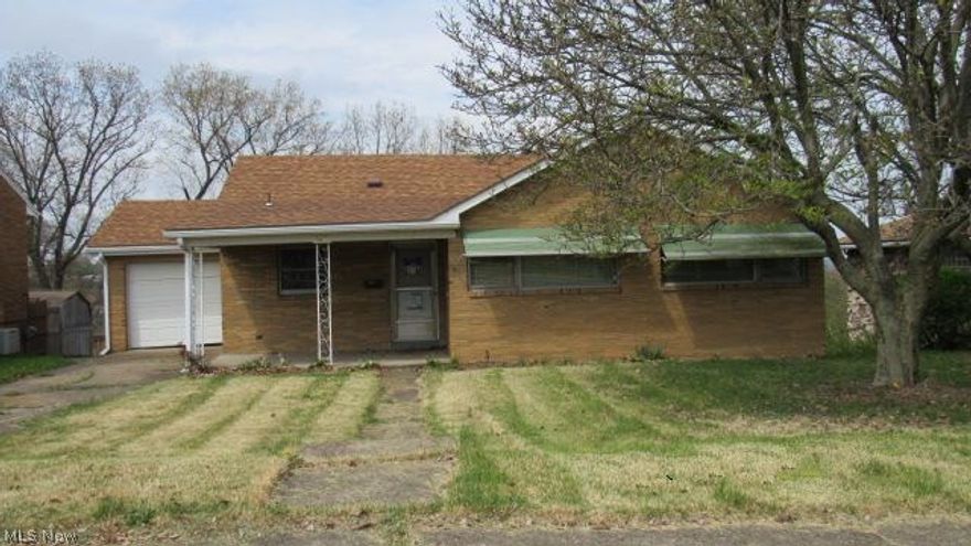 Large 1 story brick and vinyl home with 3 bedrooms and 1 bathroom.  Home features Fireplace in the living room, 1 car attached garage, rear deck, large yard and full basement.  Bring some decorating ideas and make this house your new home.