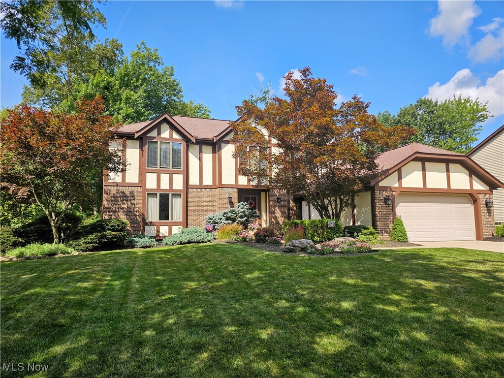 Discover this stunning four-bedroom, three-and-a-half-bath home spanning nearly 2,800 square feet of thoughtfully designed living space. The heart of this residence features a fabulous kitchen with custom cabinetry, beautiful granite counters, and high-end appliances that will inspire your inner chef and become the natural gathering place for family and friends. An L-shaped center island provides additional seating, workspace, and storage. The house was expanded in 2017 to enlarge the kitchen and family room.
An open floor plan seamlessly connects the kitchen to the spacious living areas, creating an ideal flow for daily life and entertaining. Gleaming hardwood floors guide you through the living room and dining room, and the impressive kitchen is open to the spacious family room with cozy fireplace and wet bar. Moving upstairs, you’ll find the primary bedroom with volume ceilings which serves as a peaceful retreat. A recently remodeled ensuite bathroom features a slipper tub, dual vanities and a walk-in closet providing excellent storage. Three additional bedrooms offer generous proportions with large windows, built-in storage solutions, and flexible configurations perfect for guests, home offices, or hobby spaces. The main bathroom has been recently updated with a striking new vanity, tiled flooring, and a tiled shower.
The finished lower level extends your living space with a recreation room and full bath.
An efficient HVAC system was installed in 2017 and the roof was replaced in 2011.
Step outside onto the expansive stamped concrete patio overlooking a peaceful and private wooded backyard. A large storage shed accommodates all your lawn equipment. Lush landscaping beds enhance the appeal of the exterior of the home. This lovely residence is located towards the end of a cul-de-sac street.
BRECKSVILLE-BROADVIEW HEIGHTS SCHOOLS! A perfect combination of comfortable suburban living, quality construction and thoughtful interior design details. Don't miss!!