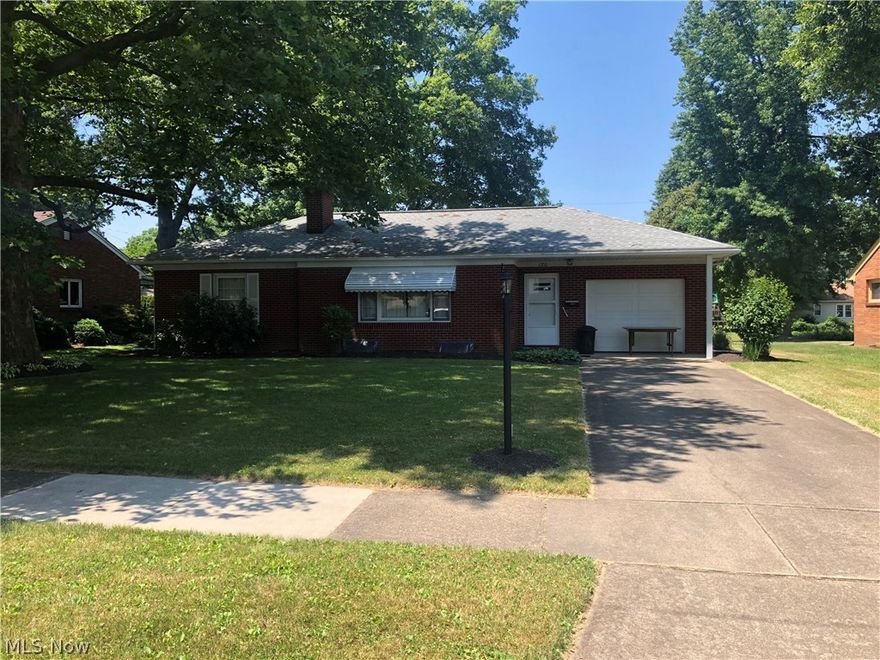 Cozy 2 bedroom, 1.5 bath brick ranch.  Fireplace (wood burner) in the living room.  12 X 8 covered rear porch.  Full basement with wood burner.  1 car attached garage with new overhead door in 2015.  Most vinyl replacement windows throughout.