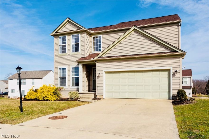 Welcome home to this beautiful 3 bed 3.5 bath colonial with lovely upgrades. Entering this home, you are warmly greeted with a two-story foyer and hardwood floors. As you enter the living room, enormous windows allow ample natural light, making it a centerpiece of the home. Set back privately before the kitchen is a half bath for guest use. Off to the right of the living room is an updated kitchen featuring white cabinetry, granite countertops, center island, and tons of cabinet space. The laundry room seats off of the kitchen to allow access to the two-car garage. Following the hardwood floors upstairs, the vaulted ceiling with the two-story foyer keeps the flow of the home open and spacious. The master suite upstairs features a vaulted ceiling and a master bath with a large walk-in closet. Two additional bedrooms with closets share the 2nd full bathroom upstairs. Heading down to the finished basement, you a greeted with more entertainment space, a new dry bar, and a full bath. To top