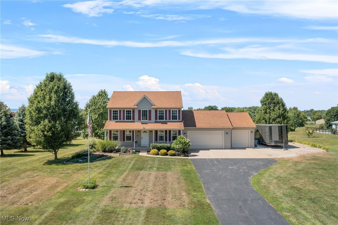 Welcome home to this breathtaking center hall colonial. As you enter the front foyer you will be greeted to your left by a sitting/library/study/office with new flooring and freshly painted. To your right you are invited into the formal dining area and beyond that is the lovely kitchen. The kitchen offers laminate counters, wood flooring, all appliances and a breakfast area for those quick meals. The great room is open and airy with tons of natural light. The pallet wall and new carpeting add to the comforting decor. Upstairs you will find the owner’s suite with luxury bath and walk in closet. 2 additional bedrooms and full bath complete the second floor. As you wander down to the partially finished basement you will see the possibilities are endless. The laundry and utility area, as well as plenty of storage completes the basement. Outside you have endless choices, both for entertaining and relaxing. The new deck of the kitchen overlooks the above ground pool and the extensive back yard. There is a covered patio off the back of the garage that offers access to the 3 car garage from the rear of the home. Imagine relaxing on your covered front porch while enjoying the views. Updates include: all new windows, flooring throughout, paint, deck, HWT, thermostat,and more! All of this on your very own 1.35 acres of natural beauty.