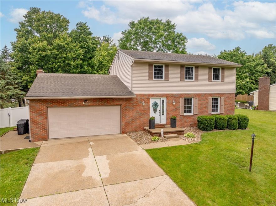 Beautiful 4 bedroom/2.5 bath home located in North Canton Schools. This turnkey home offers over 2000 square feet of living space, a fenced in backyard, and has neutral decor throughout. As you enter the property you are greeted by a generous and inviting foyer. The adjacent living room has large picture windows allowing for plenty of natural light. The well appointed eat in kitchen offers solid countertops and is open to the formal dining room. A large family room with fireplace is located just steps away from the informal dining area. The enclosed porch off the kitchen is the perfect spot to watch the sunset and entertain guests. Upstairs is home to the primary bedroom and private bath. Three additional bedrooms share a nice sized and updated bath. The lower level is a great spot for a play room, or additional entertaining area. The private fenced in backyard is perfect for kids and pets. This home has a space for everyone. Please call to schedule your private showing today.