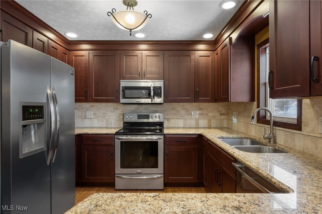 Photo of 9132 Reed Road, North Ridgeville, OH 44039 (MLS # 5175820)