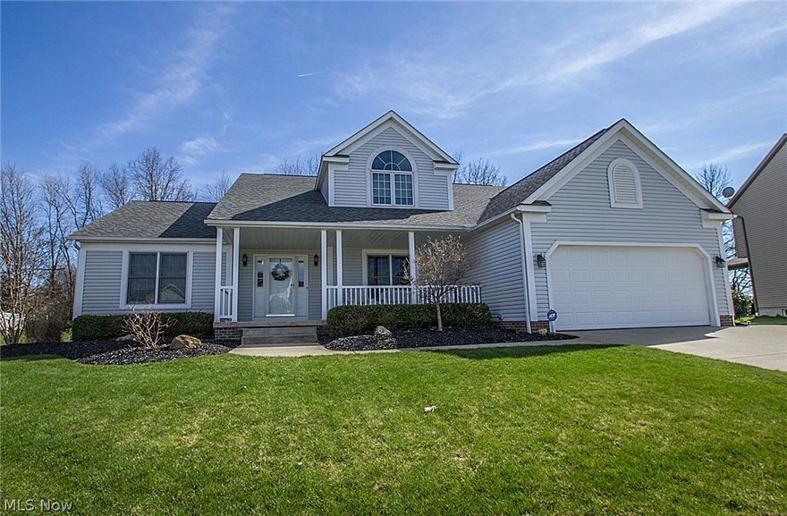 Welcome Home to this beautiful modern home settled on a quiet friendly street. Featuring a 2 story great room and first floor owner's suite with cathedral ceilings. Owner's suite bathroom comes complete with dual sinks, spacious walk-in closet and garden tub. Enjoy summer nights from the 3 seasons room while playing your favorite music from the built-in speakers. Bask in the breathtaking autumn colors from the wooded backyard view. The kitchen was completely remodeled in 2014 with all new flooring throughout, extra large stainless steel appliances, recessed lighting and granite countertops. With a mostly finished basement wired for surround sound and a bonus bedroom, there is so much space! The great room boasts a stone-to-the-ceiling fireplace with tons of window lighting. With a 2-10 Home Warranty included, this home is a MUST SEE!