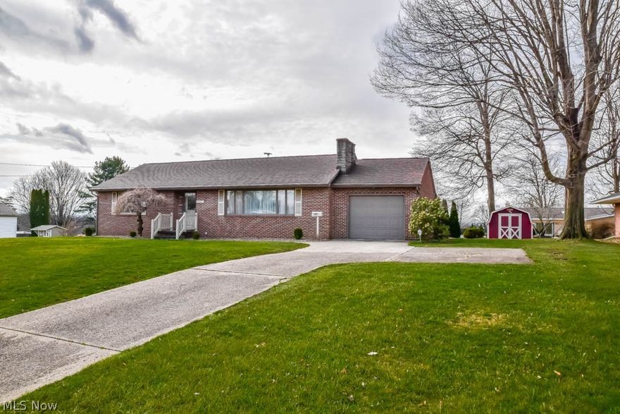 This solid brick ranch has so much potential!  Bring your decorating ideas to make this wonderful ranch home just the way you want it.  Lots of great features including a nice sized living room with a picture window and fireplace with brick surround.  The kitchen has ample cabinet space, including a pantry, dining area plus access to the attached garage making it easy to bring in your groceries. Down the hall, there are 3 bedrooms, two with double closets and a full bath.  The unfinished lower level has glazed block walls, plenty of storage space, a laundry area, and a separate shower, commode, and sink.  Situated on an almost 1/2 acre lot with a patio, shed for your lawn equipment, and an extra parking pad in the drive.  Just a little bit of updating will make this your dream home-Book your showing before it's gone!