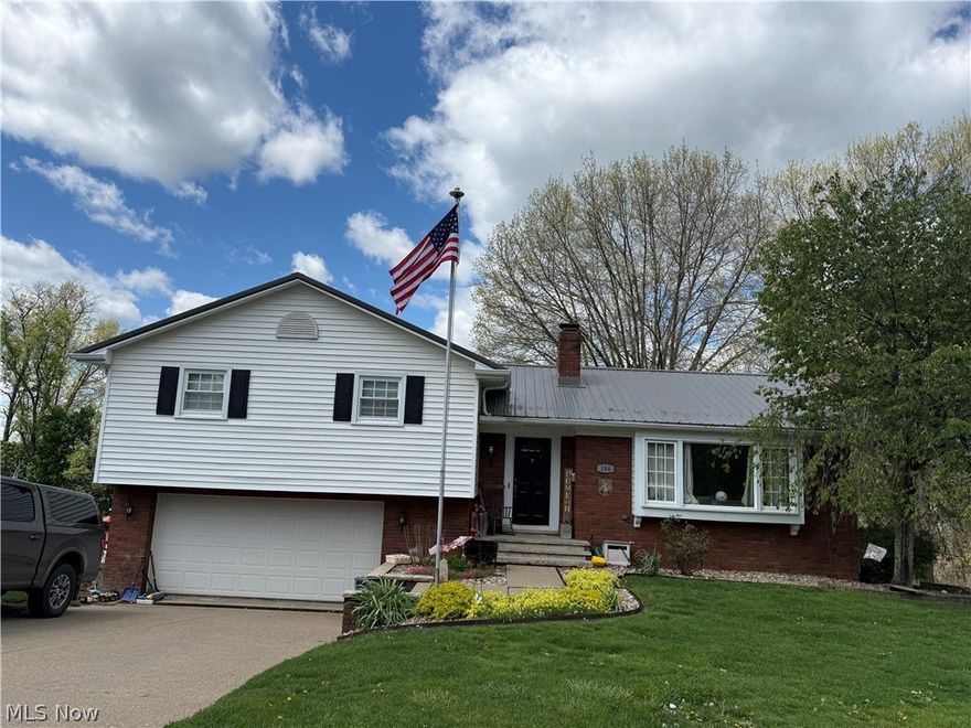Charming Comfort in the Heart of St. Clairsville. Discover the perfect blend of convenience and comfort at 104 Orchard Dr. This 3-bedroom, 2.5-bath home offers 1932 sq. ft. of well-maintained living space. Featuring hardwood floors in all the bedrooms, a spacious rec room on the lower level, and a partially fenced backyard - perfect for family time or letting your pets roam. The yard also has a nice storage shed. Nice workshop area located under the basement with door from the back of the home. This home is move-in ready and waiting for its new owners. Located just minutes from local schools, shopping, and dining in a quiet, established neighborhood. Schedule your private showing today to experience all this property has to offer.