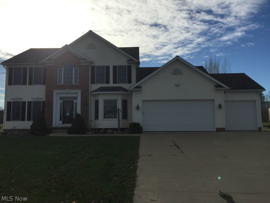 Lots of living space! 4-6 bedrooms, 3.5 baths, custom built by Yoder Builders 2002. Additional living suite in lower level with 2bd, big closet, rec room & full bath, completed in 2009. Walkout basement, 3 car garage, area of beautiful homes. 2 story foyer with wood floor, 1st floor office & laundry room, cherry kitchen with island, vaulted family room with gas fireplace, master suite with whirlpool tub, double sinks & walk in closet. Open floor plan for entertaining!