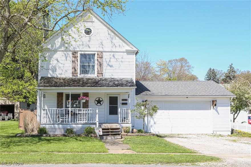 Welcome home to 24 Fenton, a gorgeous 3 bedroom colonial located in Mogadore! When you pull in, you will love the curb appeal this home offers. From the white timeless siding, to the cozy front porch, this home is visually so pleasing. Step inside and you will be welcomed with large vaulted ceiling featuring wood beams and beautiful corner, brick wood burning fireplace. The spacious dining room features a gorgeous pallet/shiplap wall and stunning light fixture. It also allows access to your private, fenced in backyard with a huge deck and above ground pool. The updated kitchen has plenty of cabinet and countertop space and includes newer stainless steel appliance (2014). Upstairs you will find a great landing space; perfect for toys or home office. Three bedrooms and a renovated full bathroom complete this upper level. A huge attic space can be found through the boy's closet. The lower level is partially finished and adds a great space for a man cave. You will not want to miss this one. Schedule your private showing today!