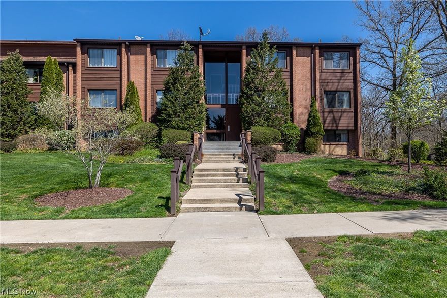 Fantastic opportunity in the sought after development of Greenwood Village!  With over 1300 sf of living space and tucked away just outside Cuyahoga Vally National Park, this home is sure to be a crowd pleaser!  Upon entry you will immediately notice the openness this floorplan has to offer. 2nd floor unit features a large patio that overlooks the wooded surroundings.   Light, airy decor throughout with a gorgeous floor to ceiling slider that lines the east wall giving off tons of natural lighting. Spacious living room leads to the formal dining room that overlooks the updated, open kitchen.  Breakfast bar and an abundance of cabinets and countertop space accent this gorgeous kitchen.  Recent updates include: Painting throughout, light fixtures, Livingroom/dining room flooring, stainless steel appliances and washer & dryer.  Oversized master bedroom features a full bath and boasts a spacious floor to ceiling mirror closet.  Second bedroom updated full bath and laundry make this home co