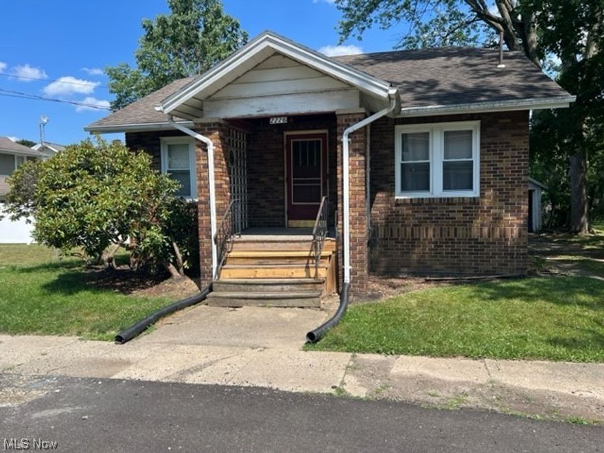 Brick bungalow with newer windows and roof located on a dead end street with two additional lots. The home features a kitchen with a separate dining room, living room and two bedrooms on the first floor.  There is a third large bedroom on the upper level.  The property offers a park like setting with the additional lots. The home is close to Mount Union and Alliance Aultman Hospital.