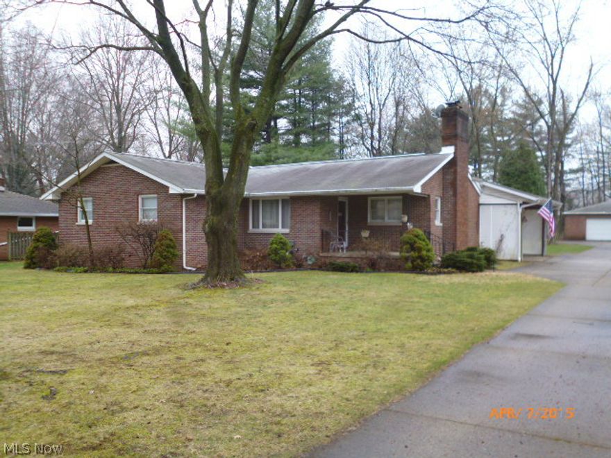 Beautiful brick ranch in the Lake Cable area sets on ¾ acre lot with large trees and plenty of outdoor space to enjoy warmer weather.  The interior offers some newer carpeting, wood floors in kitchen, dining and hallway.  The split bedroom floor plan
And finished recreation room are also very desirable.  A second kitchen and amazing amount of storage space also in the basement. 
Convenient to the airport, expressway, shopping and other services. Total sq footage includes the rec room and the enclosed back porch.