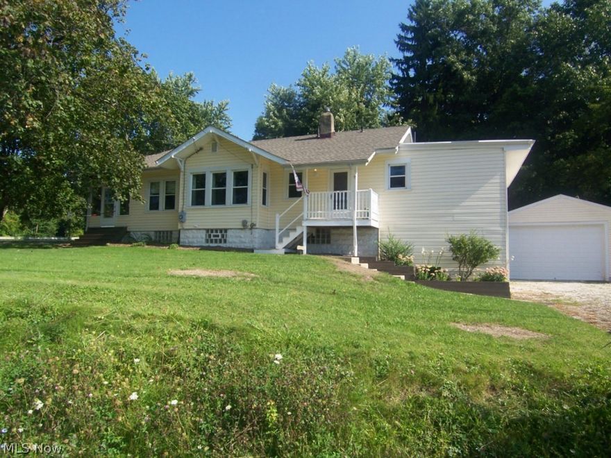 A remarkable 3 bedroom, 2 full bath raised ranch on 3/4 of an acre.  This wonderful home has a finished walk out basement with 22x11 recreation room and office.  The 24x20 2 car HEATED garage has a 10' door.  A large living room and formal dining have hardwood floors.  The updated kitchen has 42" cabinets.  The master suite opens to a large deck and wooded rear yard.  The many updates include roof, windows, bath, kitchen, basement carpet, and much more.  A screened front porch is on the side of the home.  A large laundry room, ample storage, 9' ceilings, and so much more.  Lease Purchase with Option is a possiblity.