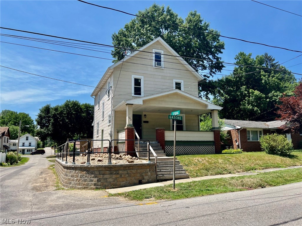4-5 bedroom home with many big ticket items replaced in the last few years that include replacement windows, roof shingles, furnace and central air unit. New retaining block wall and railing added on the south side. Laundry was brought up to the second floor and put in the one bedroom that is a passthrough to the third floor finished attic/5th bedroom and another bedroom had clothes racks added and was used as a walk in closet which could be removed and restored to its original use. Wonderful solid wood accents and hardwood floors in some rooms are indicative of a house of this area and compliment the beautiful stained glass accent door on the front. Interior has had a face lift as well with a coat of neutral paint and updated electric and plumbing as well as an additional half bath added on the main level. Detached garage has three bays plus room for workbench space and is great condition with electric door openers on all. Partially fenced back yard would be easy to fully enclose. This is a phenomenal property with basically everything already done. Only one lucky buyer will get to call this house a home. Do not delay...call your realtor right away to schedule your personal tour!