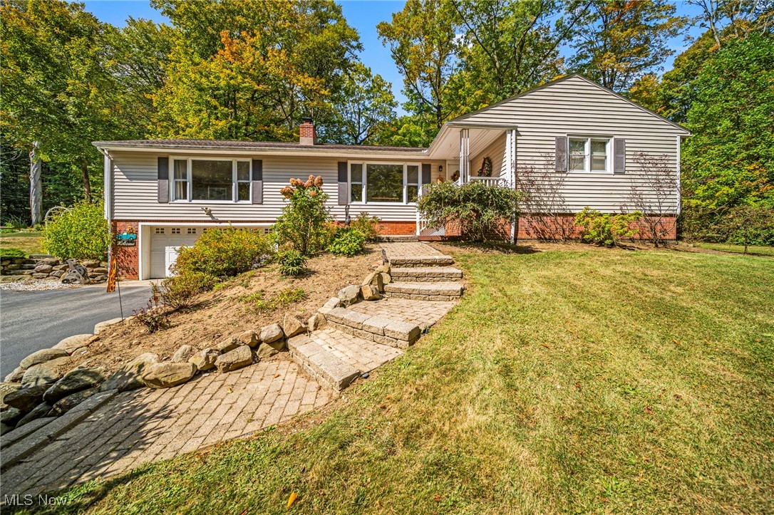 Welcome Home to this charming ranch located at Bass Lake community in Chardon School District!
Home Features Spacious Living room with built ins and hardwood floors. Updated Eat-in Kitchen with LTV Floor, Granite Counters, Appliances and New Cabinets walks out to Deck with Lots of Outdoor Entertaining space. The Large Family Room Features Stone Fireplace and Large Windows. Beautiful Hardwood Floors and Fresh Neutral Colors Throughout. Potential 4th bedroom in Basement.
Multitude of Updates completed in 2011 Including (Basement Waterproofing, Furnace and Air Conditioning, Roof, Siding, Windows and Doors.) 2025 Updates: Pressure tank for well, Hot water tank, generator hook up and portable generator stay. Home warranty for your peace of mind.
