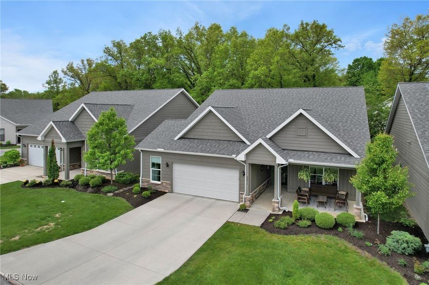 Rare Opportunity with Immediate Move in to this One-of-a-Kind Custom-Built Ranch. The Haven Model is a free standing open concept floor plan with 1,562 sq ft.  Situated on a rare gorgeous private wooded lot lush with landscaping and wildlife.  Enjoy listening to nature from your Upgraded remote operated screened in porch!  Features 2 bedrooms, an additional flex room/office with closet, 2 baths, covered front porch, fireplace with shiplap feature wall and rustic beam mantle, luxury vinyl plank flooring, 36" kitchen cabinets, 7' island with exotic granite, high-end appliances including a Viking Range, skylights. Two Plus car heated garage with 6' extension perfect for workshop, storage, or golf cart. HVAC all recently replaced with Upgraded components. You deserve a maintenance-free lifestyle with exterior repairs, lawn care, and snow removal taken care of and fun community social events. The Courtyards at Plum Brook is located inside the Sanctuary at Plum Brook-Phase II. Minutes to freeways, shopping, medical facilities, dining, entertainment, golf, across from Plum Brook Country Club and Osborn Metro Park with dog park. FHA & VA approved.